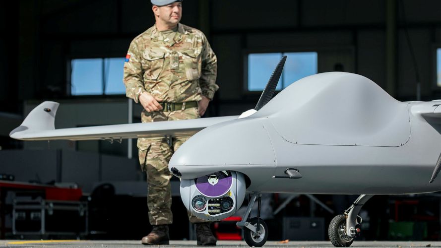 A Royal Artillery soldier stands next to a Tekever AR5 - a state-of-the-art medium-altitude and medium-endurance fixed-wing UAS optimised for intelligence, surveillance and reconnaissance, border patrol, search and rescue, and other critical maritime missions A Royal Artillery soldier stands next to a Tekever AR5 - a state-of-the-art medium-altitude and medium-endurance fixed-wing UAS optimised for intelligence, surveillance and reconnaissance, border patrol, search and rescue, and other critical maritime missions
