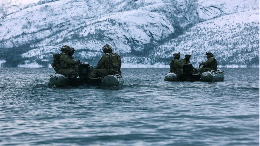 In northern Norway, Royal Marines from Shore Reconnaissance Troop (SRT) prepare to conduct a beach assault 