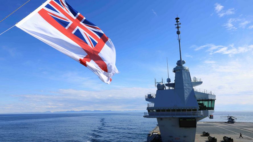 The White Ensign flies from the forward tower of HMS Prince of Wales as the flagship takes part in Dynamic Mongoose 26 - Nato's premier anti-submarine warfare exercise held in the High North and North Atlantic