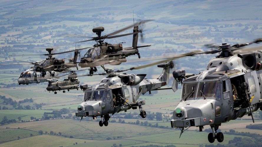 A Royal Navy Merlin Mk2, a Royal Air Force 22 Squadron Chinook HC.MK 6, two Army Air Corps AH-64Es, and two Army Air Corps Wildcat AH.1's during Exercise Hades Warrior (Picture: MOD) 19082026 A Royal Navy Merlin Mk2, a Royal Air Force 22 Squadron Chinook HC.MK 6, two Army Air Corps AH-64E, and two Army Air Corps Wildcat AH.1's during Exercise Hades Warrior Pic MOD