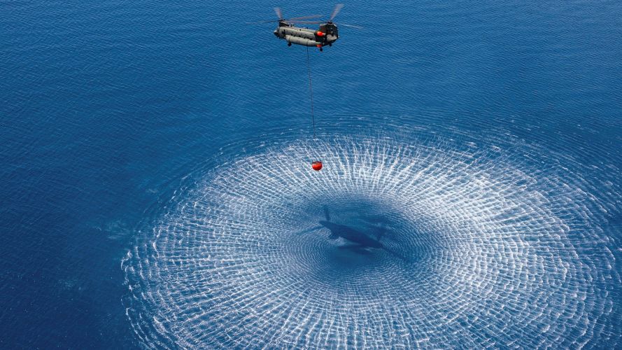 An RAF 1310 Flight Chinook in the hover, filling a firefighting bucket at the start of wildfire season in Cyprus (Picture: MOD) 19082026 RAF 1310 Flight Chinook in the hover, filling a firefighting bucket at the start of Wildfire season in Cyprus pic MOD