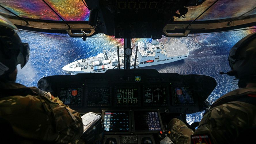 RFA Tidespring seen from the cockpit of its embarked 814 NAS Merlin Mk2 helicopter during the UK Carrier Strike Group deployment, Operation Highmast (Picture: MOD) 19082026 RFA Tidespring seen from the cockpit of its embarked 814 NAS Merlin Mk2 Helicopter during the UK Carrier Strike Group deployment, Operation Highmast pic MOD