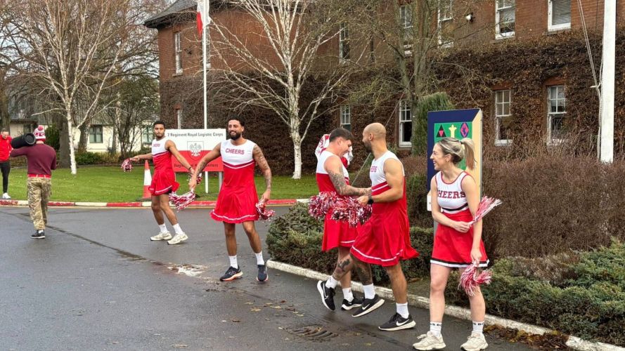 Members of the 7 Regiment of the Royal Logistics Corps ready personnel with a pom pom display