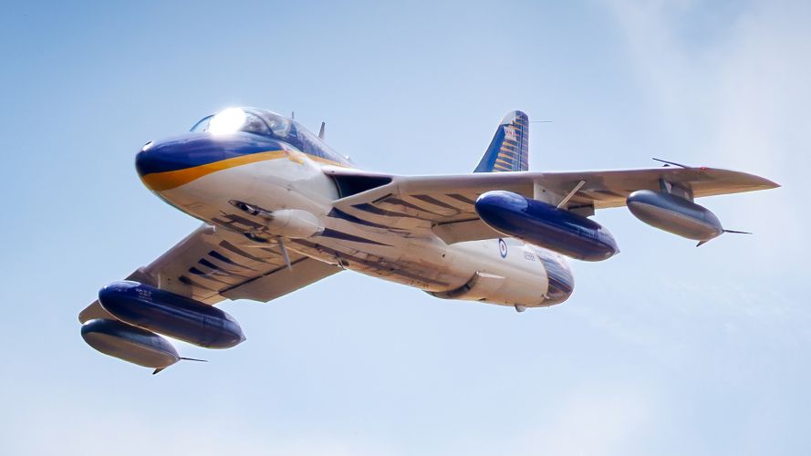 A Hawker Hunter flies over RAF Cranwell - exactly 75 years after chief test pilot Neville Duke flew the prototype, WB188, from Boscombe Down