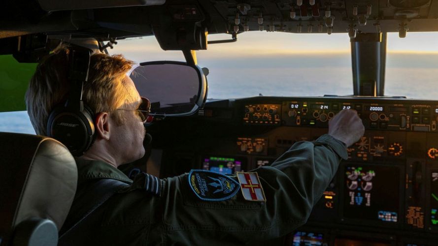 Donning Maverick-style shades, an RAF aviator is captured in the midst of an operational sortie Donning Maverick-style shades, an RAF aviator is captured in the midst of an operational sortie