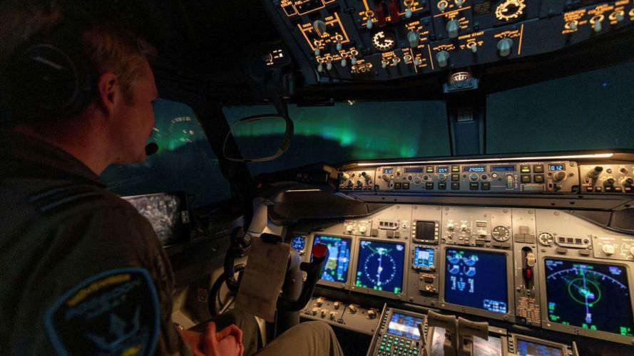 The cockpit being treated to a display of the Northern Lights during its decent into Keflavik Air Base The cockpit being treated to a display of the Northern Lights during its decent into Keflavik Air Base