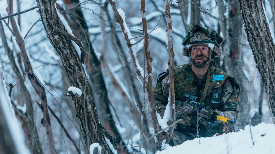 A Para observes enemy soldiers from the Japanese Ground Self Defence Forces' 