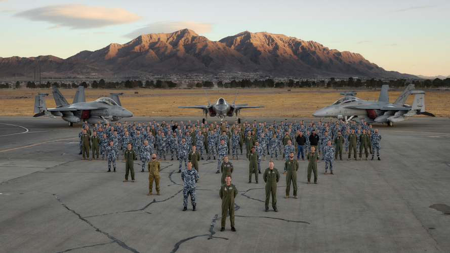 Coalition personnel pose for a group photo during Exercise Bamboo Eagle