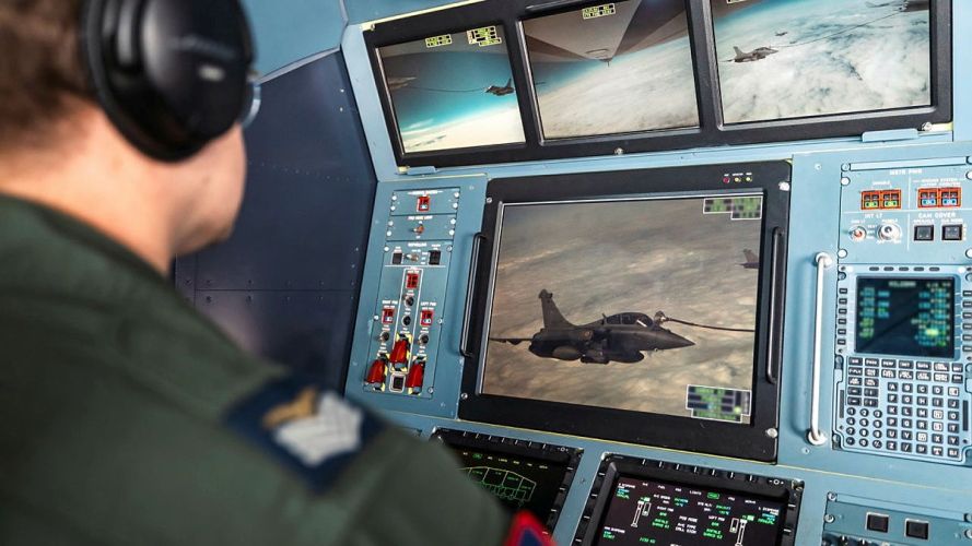 An RAF crew member viewing French Air and Space Force Dassault Rafale aircraft being refuelled from an RAF Voyager during Exercise Ramstein Flag (Picture: MOD) Ex Ramstein Flag 2026 cred MOD