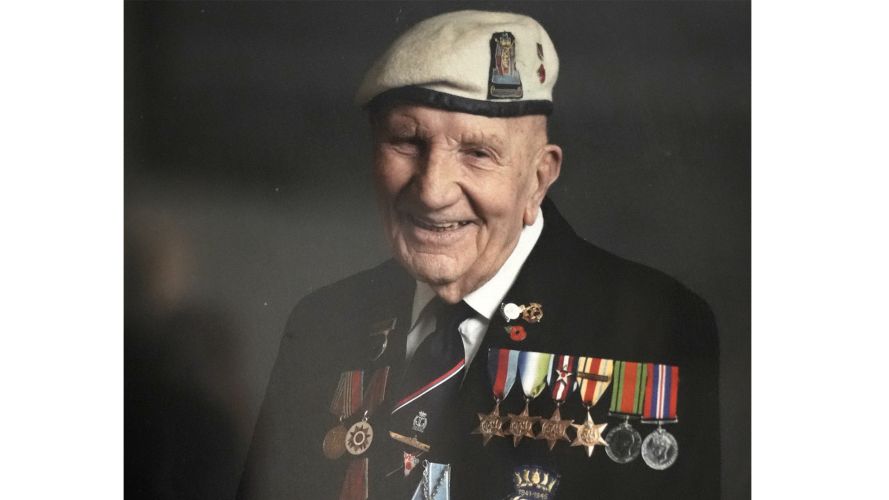Mr Shelley pictured with his medals in earlier years 