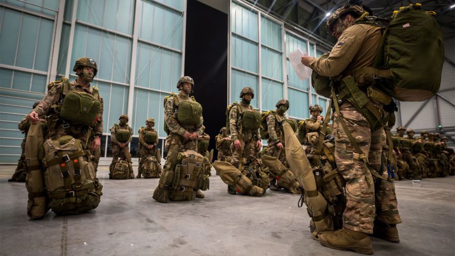 French paras from 11e Brigade Parachutiste get a final briefing in the hangar before boarding their aircraft for the drop with their colleagues from the UK (Picture: French defence ministry)