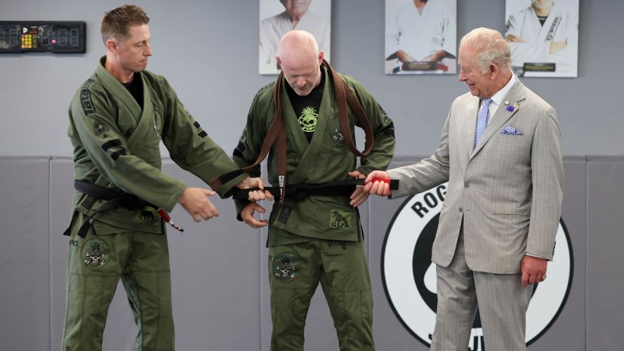 And awarded a black belt to a member of the REORG team during a grading ceremony (Picture: PA)