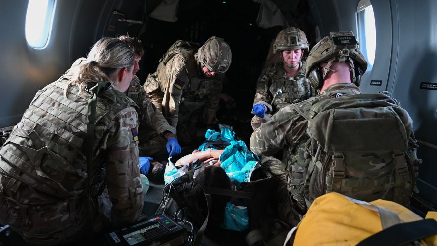 Medics practise a simulated medical emergency on board a USAF C-146A Wolfhound (Picture: USAF) Medics practice a simulated medical emergency on board a USAF C-146A Wolfhound
