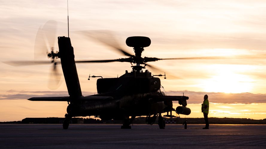 An Apache from 673 Squadron, 7 Army Air Corps, lands at RAF Valley during day and night training sorties over Snowdonia national park