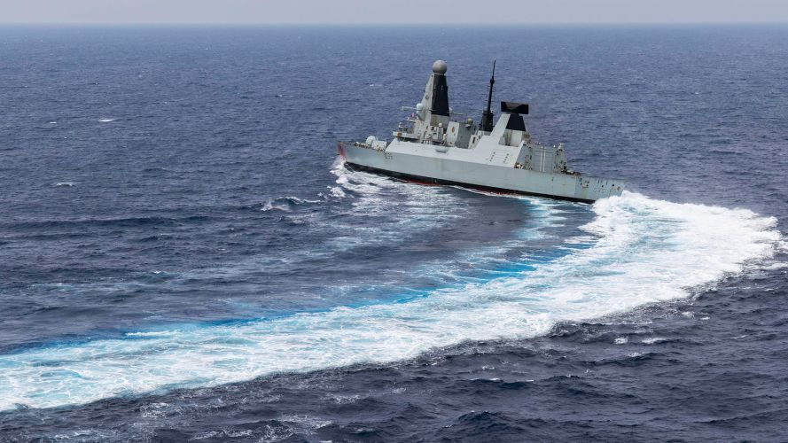 HMS Dragon is snapped from a Wildcat helicopter as the ship conducts high-speed manoeuvres as she continues to carry out air defence operations in the Eastern Mediterranean HMS Dragon is snapped from a Wildcat helicopter as the ship conducts high-speed manoeuvres as she continues to carry out air defence operations in the Eastern Mediterranean (Source: MOD)