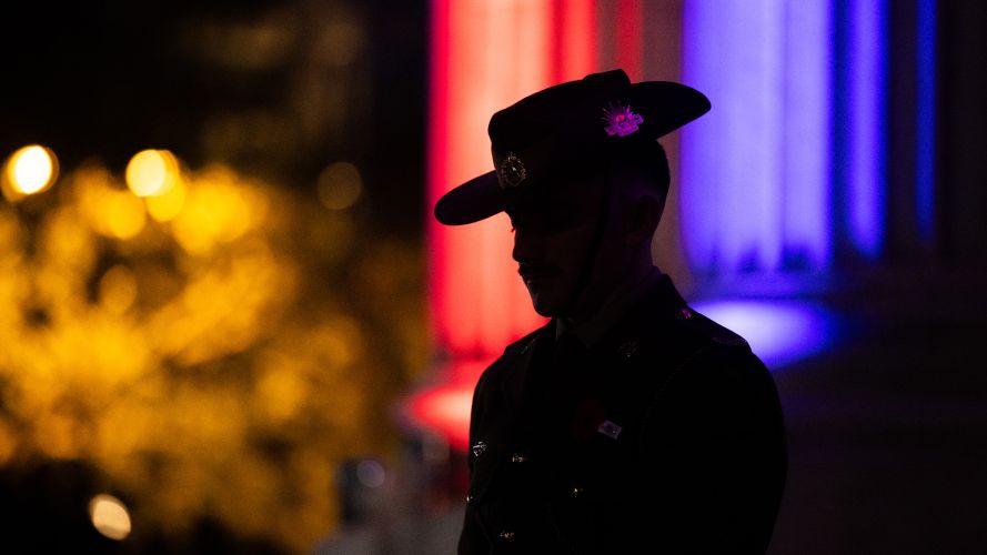 Members of the Australian and New Zealand armed forces parade at Wellington Arch on ANZAC Day, which commemorates those who fought and died in wars, particularly at Gallipoli in 1915-16