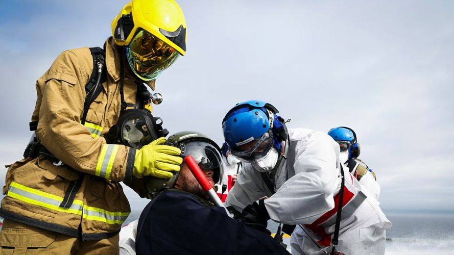 A 'casualty' is treated on HMS Queen Elizabeth's flight deck during the crash-on-deck exercise (Picture: MOD) HMS Queen Elizabeth crash-on-deck exercise