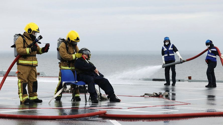The drill brought together the ship's company and Standing Sea Emergency Party to rehearse the rapid response that would be required following a real-life crash landing on the flight deck (Picture: MOD) HMS Queen Elizabeth crash-on-deck exercise