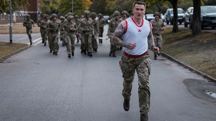 PTI leads the log run for 255 (Special Operations) Signal Squadron during their Formation Day (Picture: MOD) 255 (Special Operations) Signal Squadron taking part in Battle PT during their Formation Day cred MOD