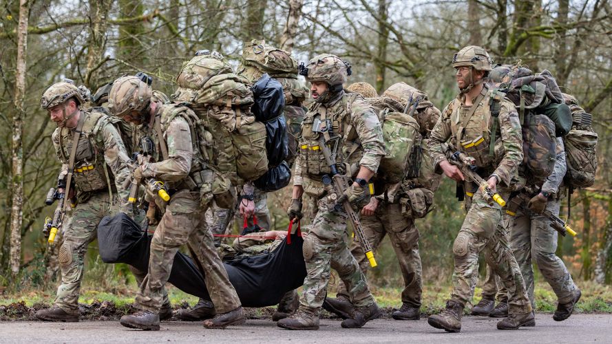 Soldiers from 2 Para extract a casualty during Exercise Orion in France - hauling a stretcher is something they are very familiar with, having done the stretcher race on P Company