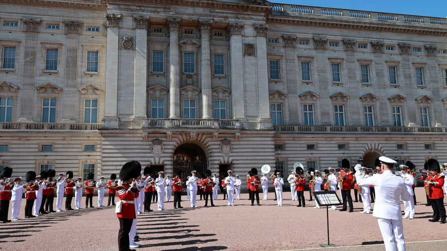 The two performed in the forecourt at Buckingham Palace in central London (Picture: MOD)