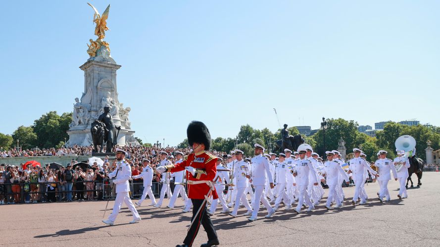 The Ukrainian Naval Forces Band marching past the Queen Victoria Memorial in front of thousands of spectators (Picture: MOD)