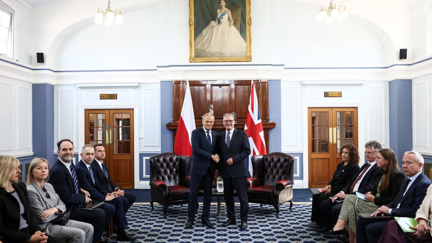 Sir Keir and Mr Tusk are flanked by their teams during the bilateral meeting (Picture: PA)