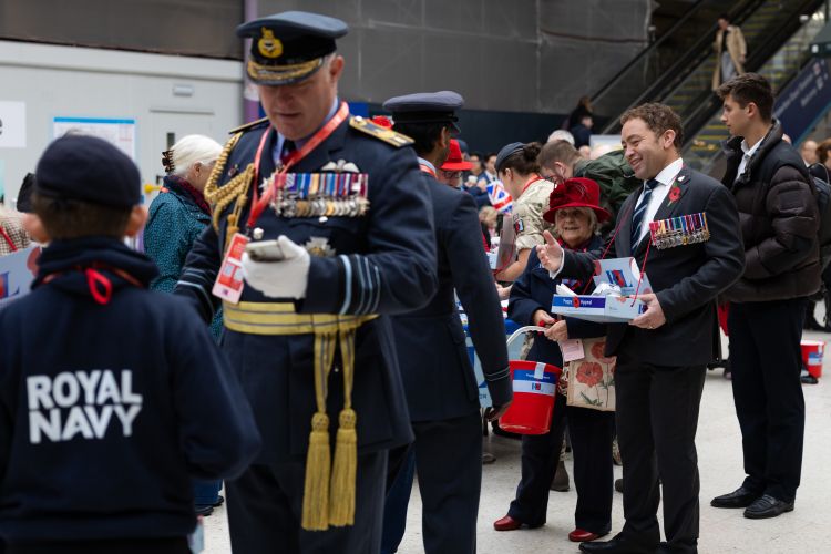 Veterans and People Minister Calvin Bailey raised proceeds just behind the head of the RAF With Minister for Veterans and People, Calvin Bailey raising money just behind him
