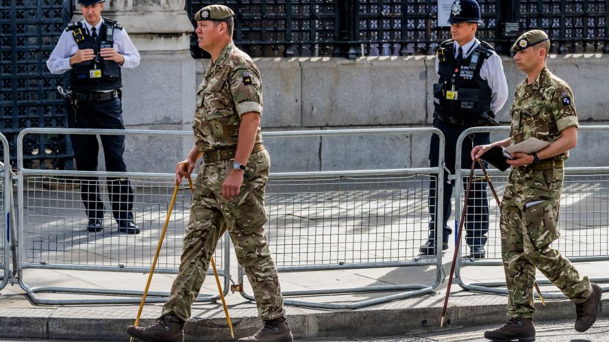  Senior Guards Warrant Officers measure out the area, with pace sticks, in advance of the State Funeral for Queen Elizabeth