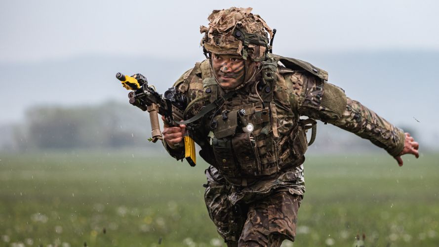 2nd Battalion The Royal Gurkha Rifles soldier bounds forward towards an enemy position during Exercise Wessex Storm 28042023 CREDIT MOD Crown Copyright.jpg