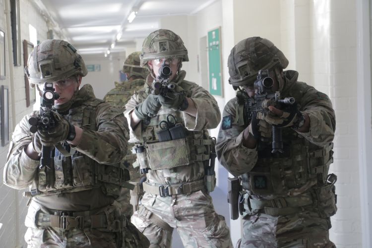 Personnel look for an 'enemy' target.