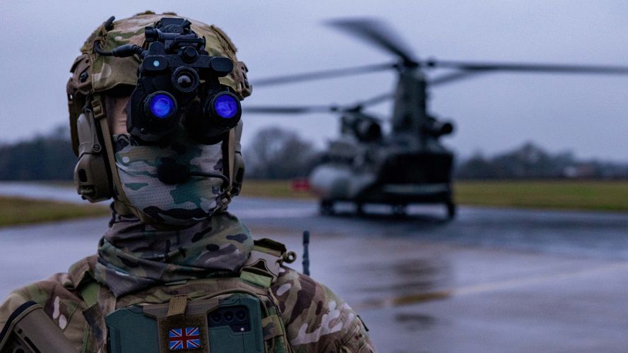 A special operations soldier from 4th Battalion, The Ranger Regiment works with a Chinook at RAF Leeming during the two-week Exercise Hyperion Storm