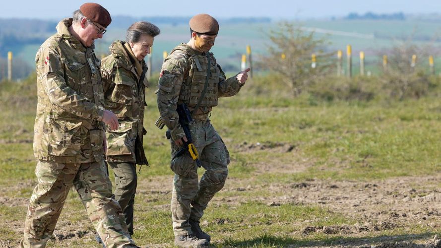 Brigadier Nick Orr (left), Princess Anne and Lt Col David Welford (MBE) walking through Salisbury Plain Training Area (SPTA) during Ex Iron Cyclone (Picture: MOD) Princess Anne at Salisbury Plain training area