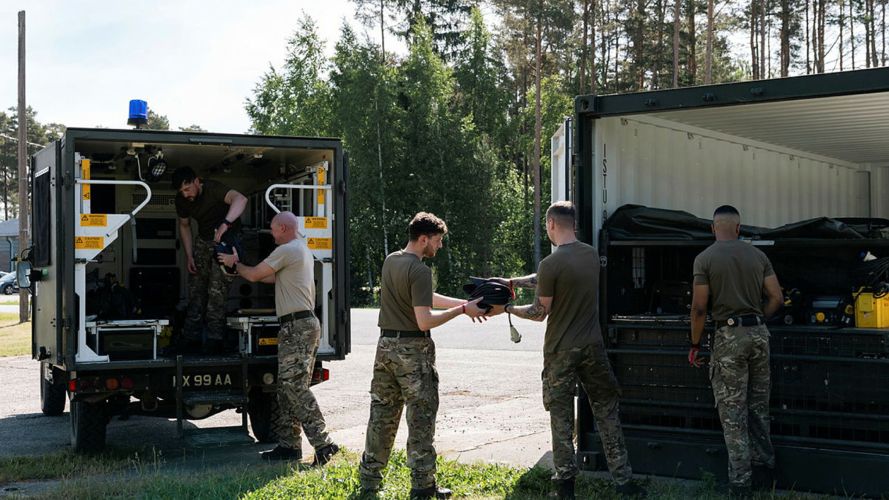 RAF personnel help fill the battlefield ambulance (BFA) with deployed kit during the set-up of Exercise Vigorous Warrior (Picture: MOD)