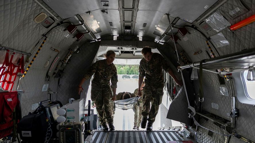 The RAF Medical Team load a casualty onto an aircraft during an aero casualty evacuation (casevac) (Picture: MOD)