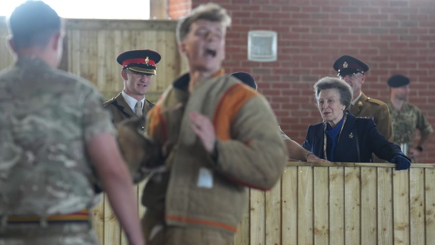 The Princess Royal watching bite training by an attack dog during a visit to Kendrew Barracks in Cottesmore (Picture: PA) The Princess Royal watching bite training by an attack dog during a visit to Kendrew Barracks in Cottesmore pic PA