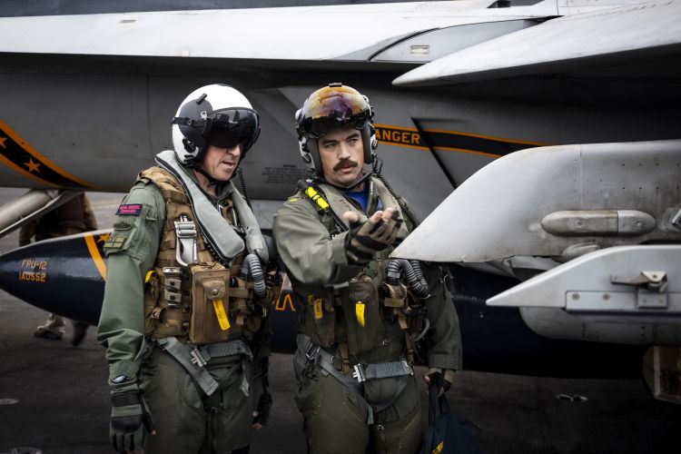 Gen Sir Jenkins conducted pre flight checks with Lt Cmdr Chris Kapuschansky, assigned to Strike Fighter Squadron 213