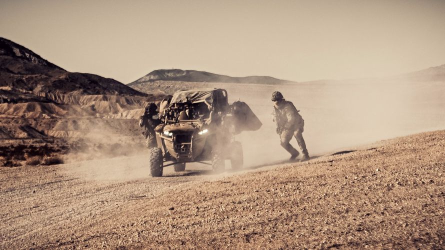 Royal Marines defeated the US Marine Corps while testing a new formation during a fiery five-day exercise battle in California's Mojave Desert (Picture: MOD). 40 Commando Royal Marines with MRZR ATV after taking simulated contact 10102021 Credit MOD.jpg