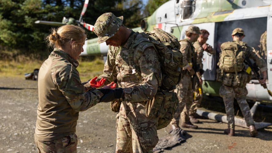 A soldier from 8 Training Battalion Royal Electrical Mechanical Engineers during battlefield casualty drills (Picture: MOD) 8 Training Battalion Royal Electrical Mechanical Engineers simulate battlefield casualty drills Exercise Cambrian Patrol 2026 Breacon Beacons 051026 CREDIT MOD