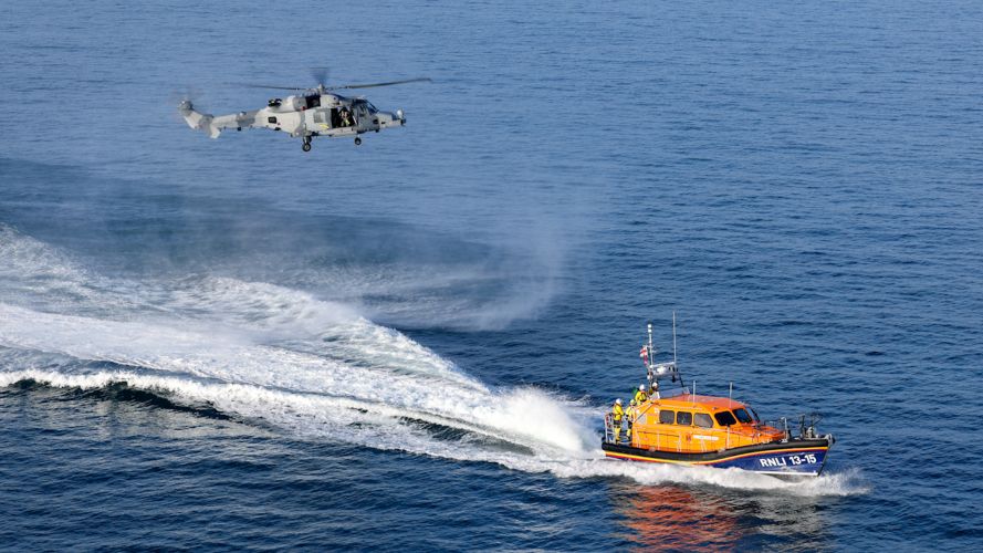 847 NAS Wildcat approaches the RNLI Lifeboat 25022024 CREDIT MOD