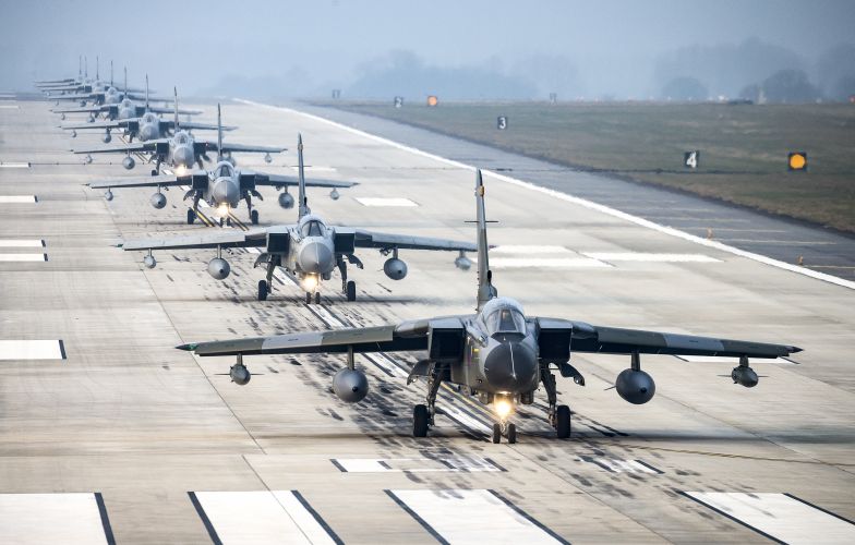 9 Tornado GR4's taking part in the 9-Ship farewell flypast over Marham and Cranwell CREDIT RAF