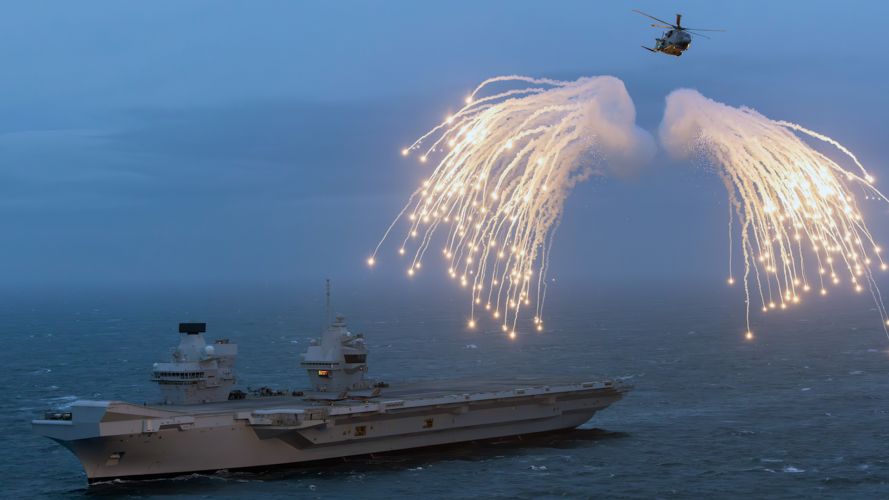 A Merlin helicopter from 820 Naval Air Squadron loaded and fired flares from HMS Prince of Wales 27022024 CREDIT MOD