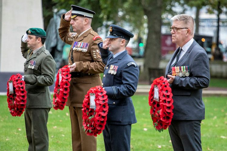 A Royal Marine Bugler played the Last Post as representatives from the services and veterans organisations laid wreaths at the Iraq and Afghanistan Memorial in London