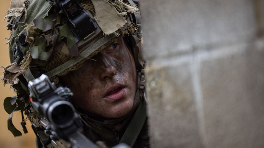 A Soldier in a fire position on an urban assault during Exercise Iron Cyclone 27072023 CREDIT MOD.jpg