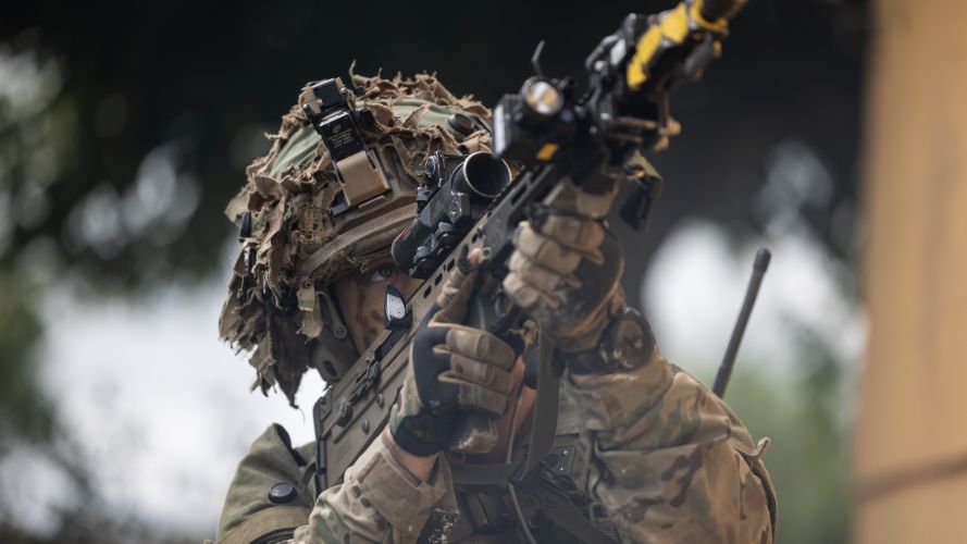 A Soldier in a fire position on an urban assault during Exercise Iron Cyclone 28072023 CREDIT MOD.jpg