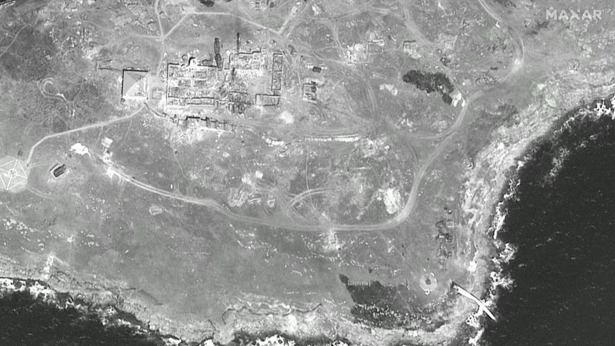 A close up image reportedly showing damage to Russian positions near the Snake Island shoreline 17 June (Picture: Maxar Technologies).
