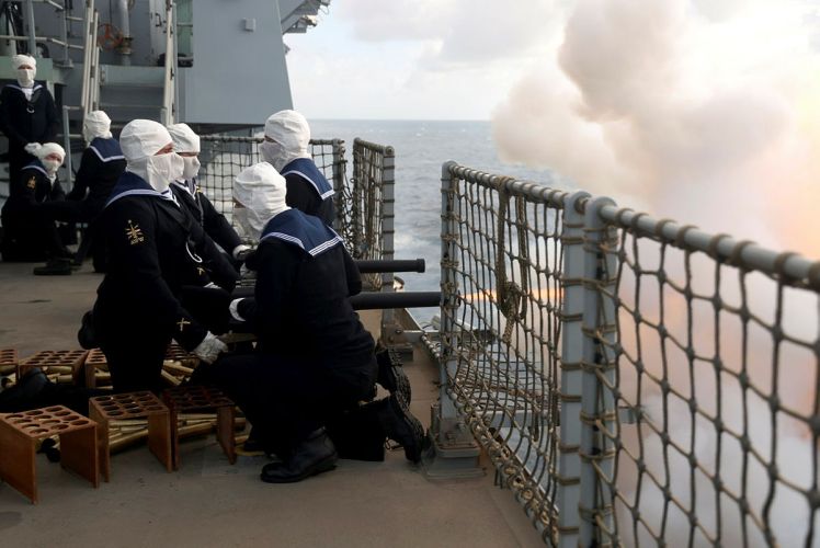 A mid action shot of a gun salute on HMS Queen Elizabeth to mark the passing of HM Queen Elizabeth II (Picture: MOD).