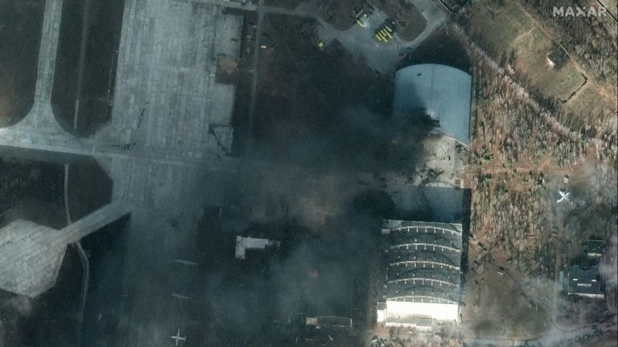 A satellite image appears to show damaged aircraft hanger in Ukraine 27022022 CREDIT Maxar Technologies,Handout via REUTERS.jpg