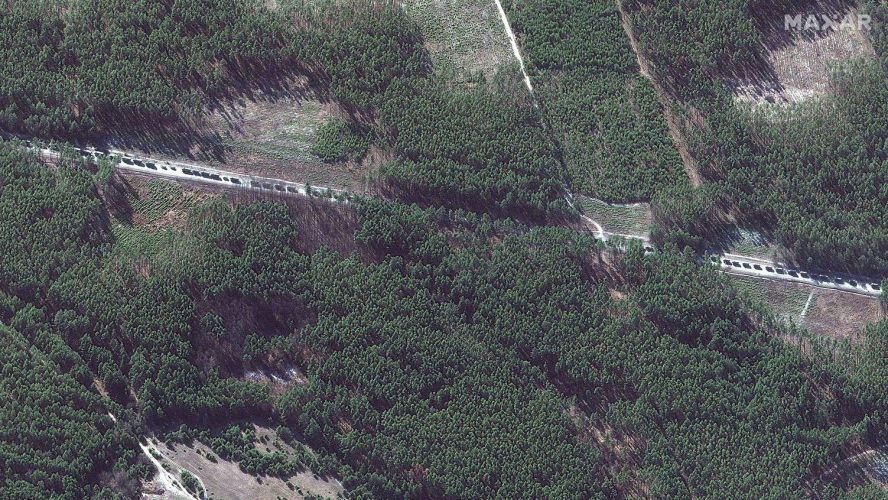 A satellite image of the Russian convoy near Kyiv, snaking through woodland 28022022 CREDIT Maxar Technologies,REUTERS.jpg