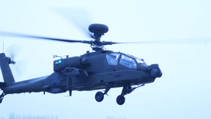 A side view of the Apache AH-64E.